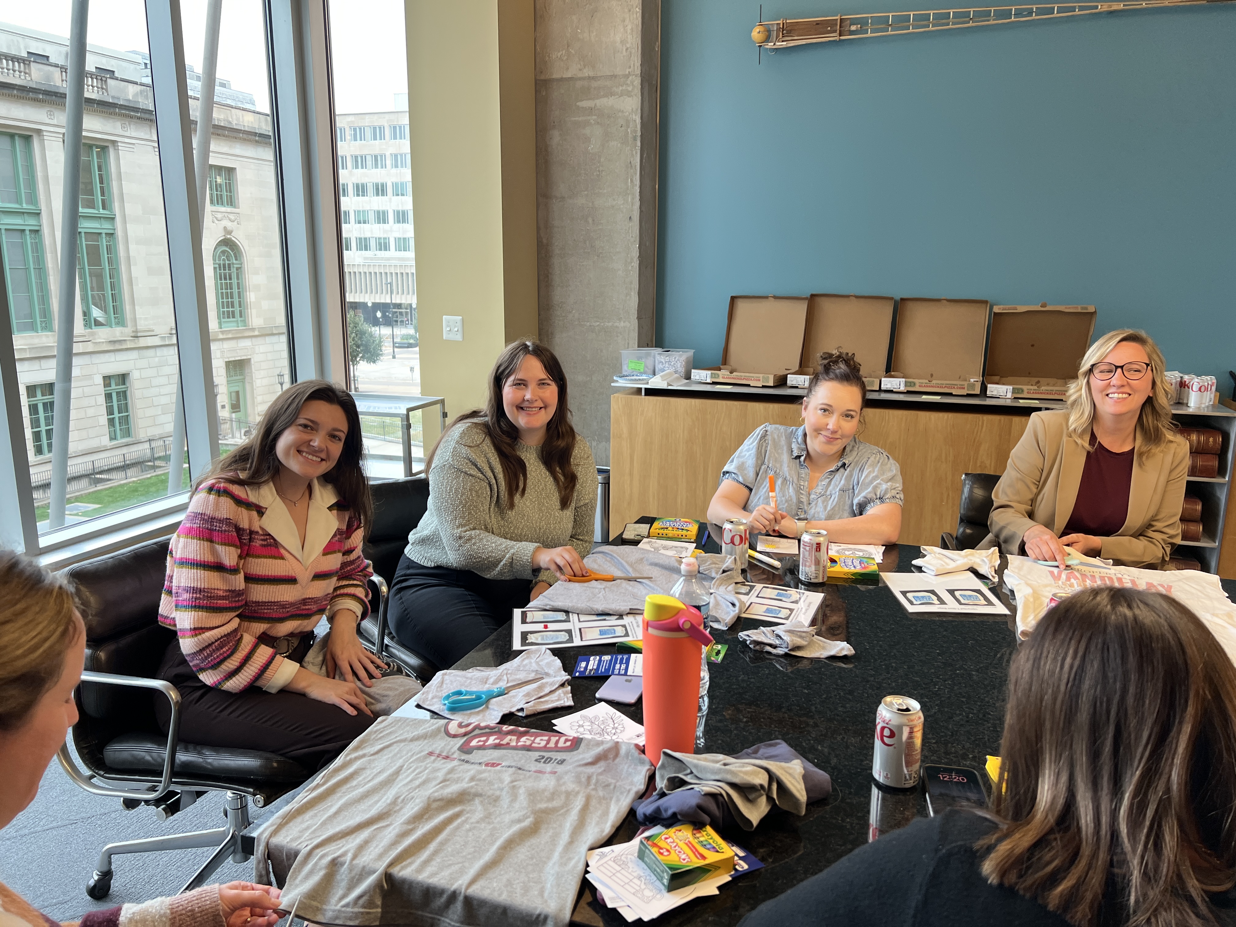 ULI employees getting creative making bag T-Shirts for the 2025 United Wat Campaign 