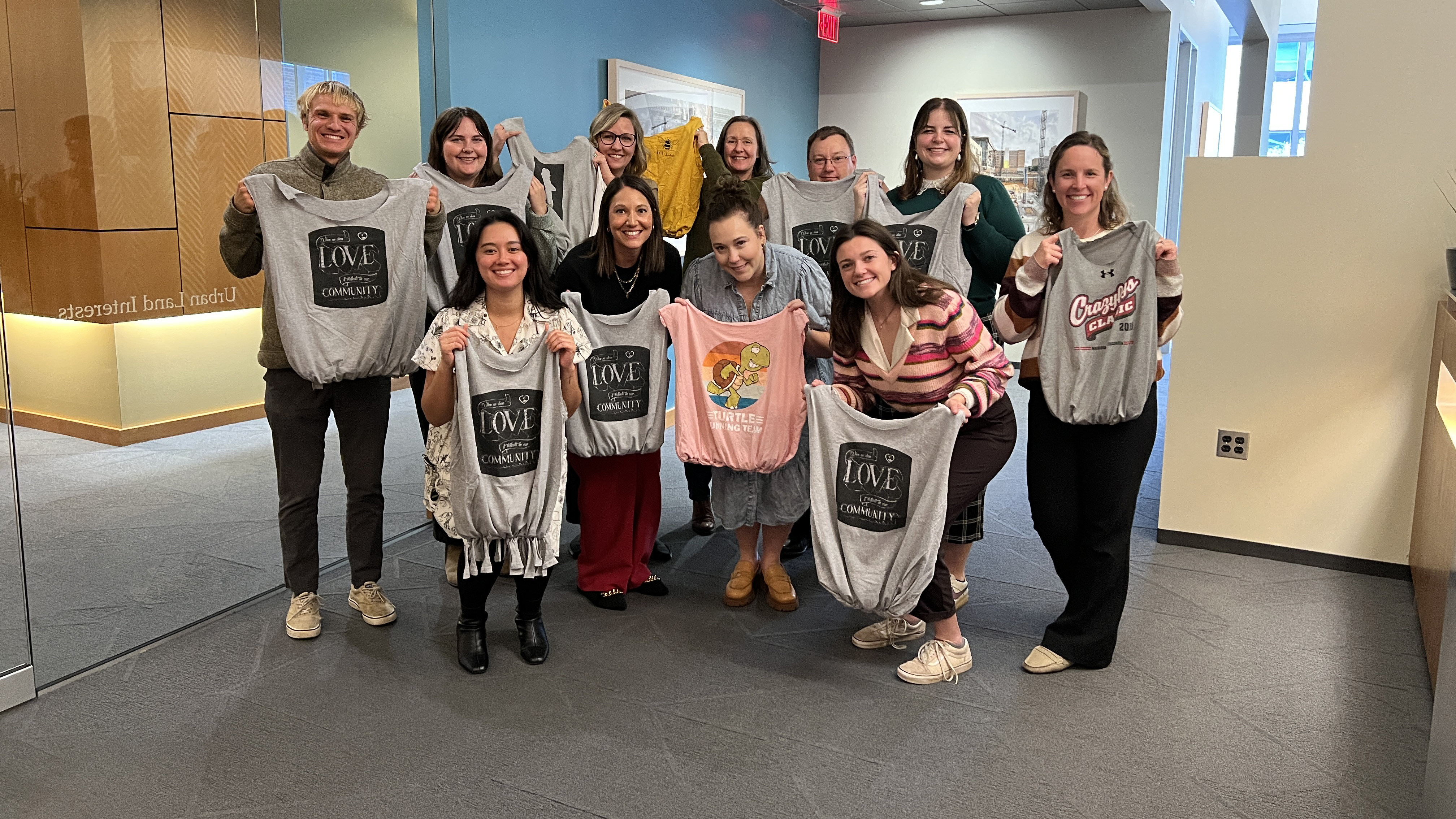 ULI employees getting creative making bag T-Shirts for the 2025 United Wat Campaign 