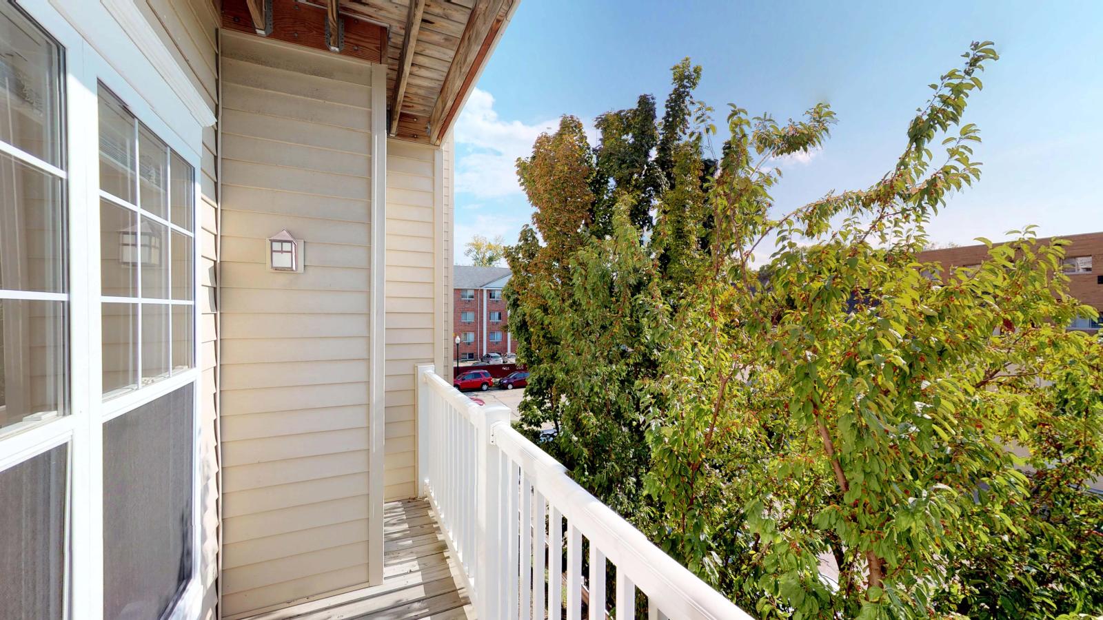 City-Place-203-Patio-view-sunny day-downtown.jpg