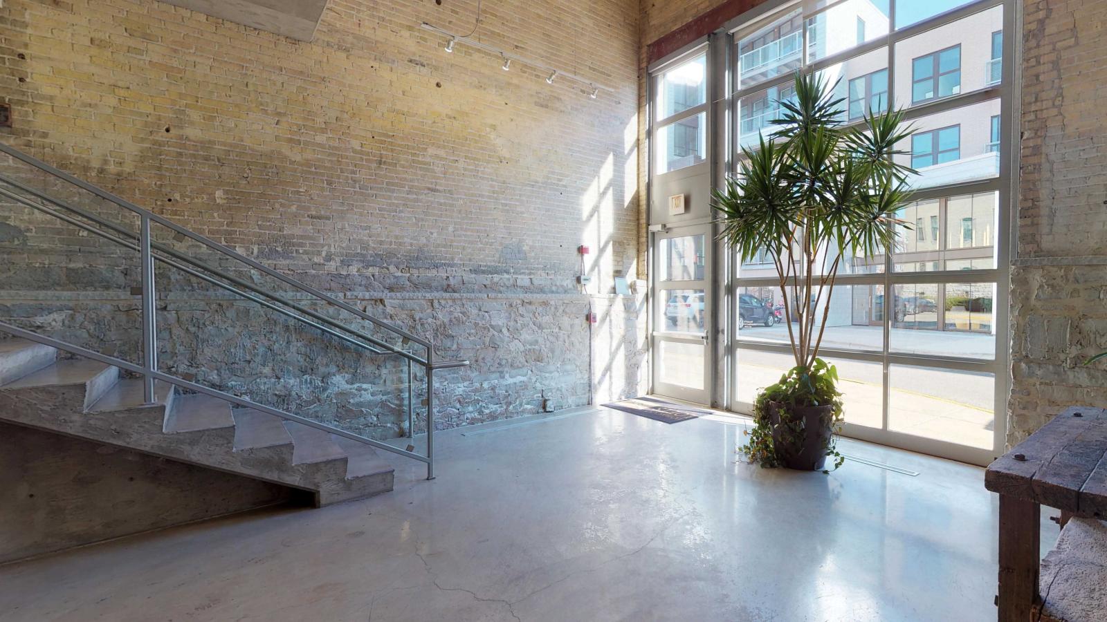 Tobacco-Lofts-Lounge-Entrance-Design-Historic-Downtown-Apartments-Madison-Yards