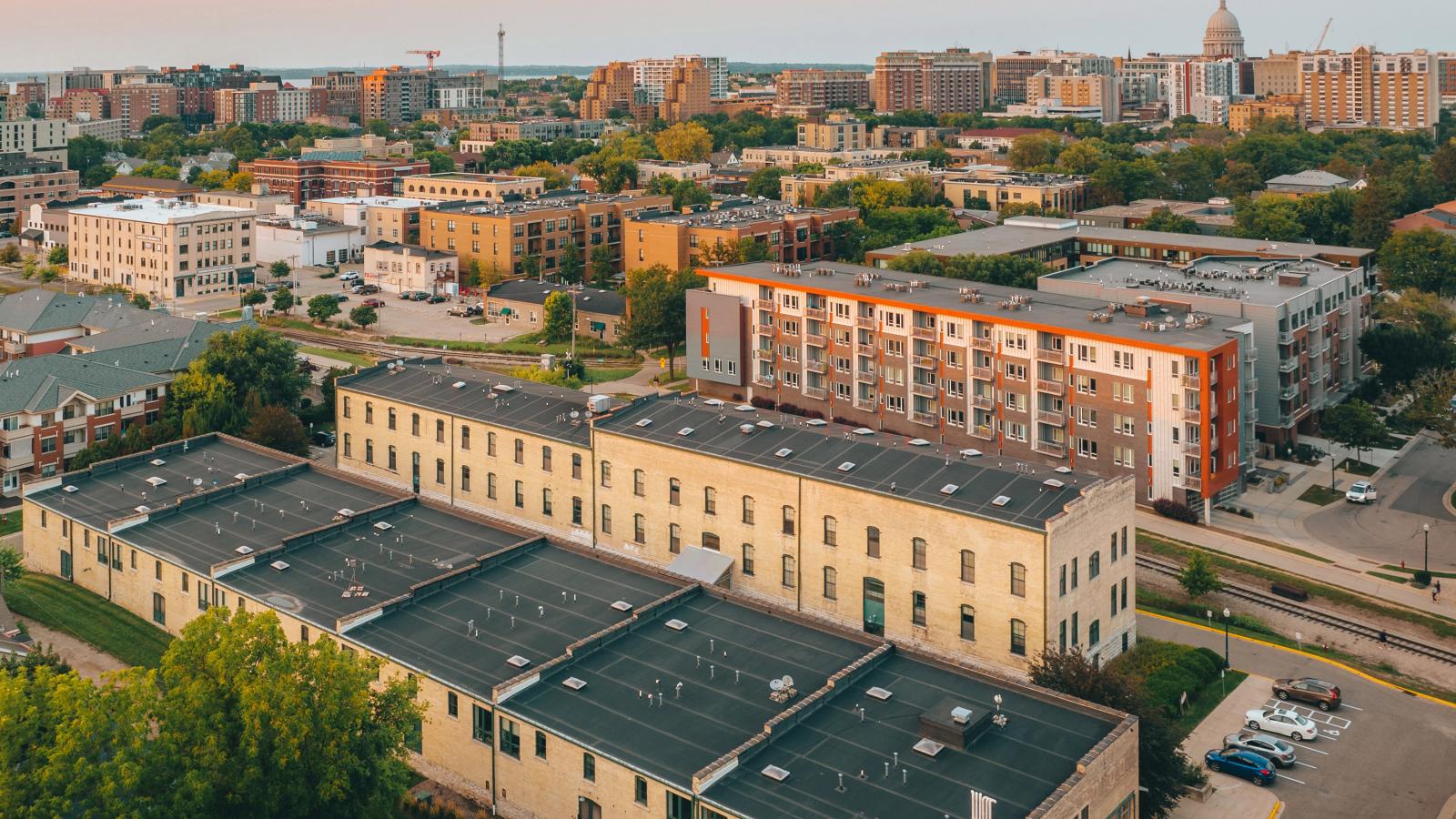Tobacco-Lofts-Historic-Lofted-Apartments-Downtown-Madison-Exposures-Design-Brick-Beams-Vaulted-Ceiling-Skylight-Yards-Lifestyle.jpg