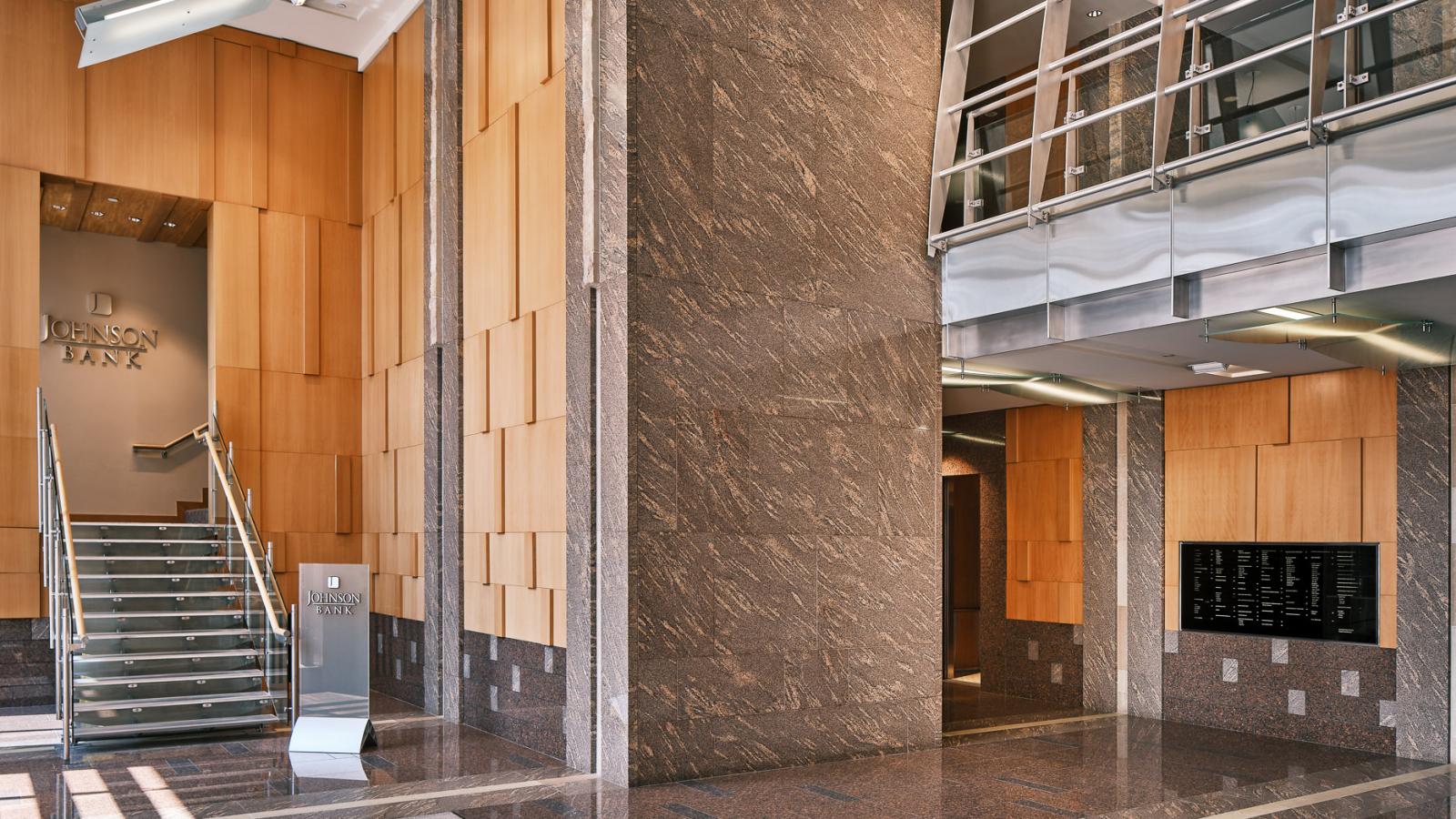 Modern lobby with high ceilings and natural light at 10 East Doty