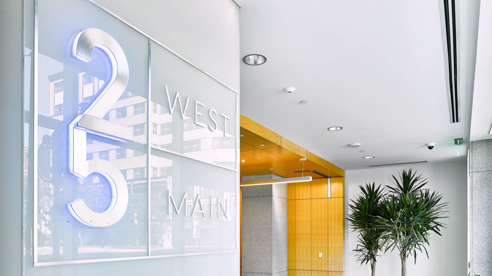 25 West Main lobby with a sleek entrance, high-end finishes in downtown Madison