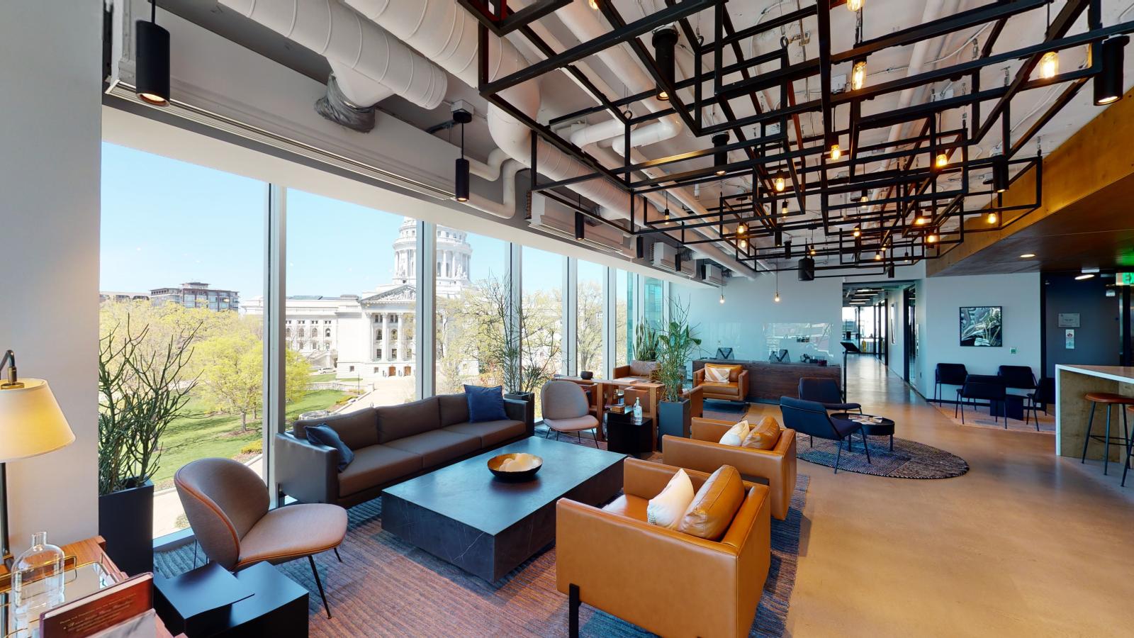 Urban Office Co. at 25 West Main with floor-to-ceiling windows showcasing a Capitol view