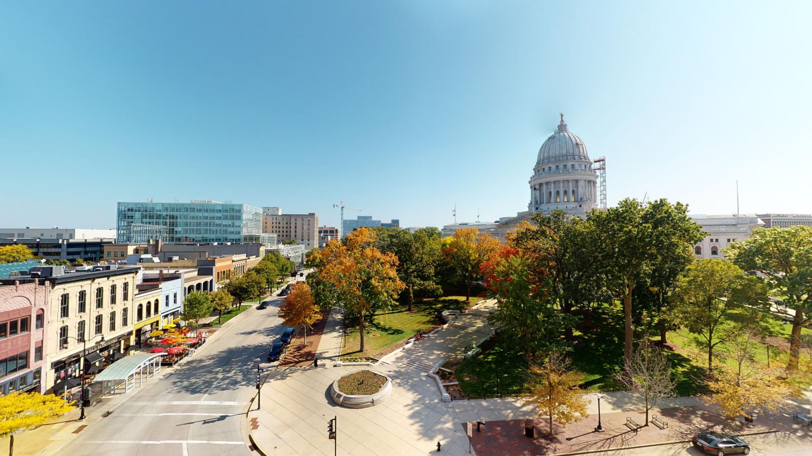 Picturesque view of the Wisconsin State Capitol from a private tenant balcony at 44 East Mifflin, offering an unbeatable downtown Madison skyline.