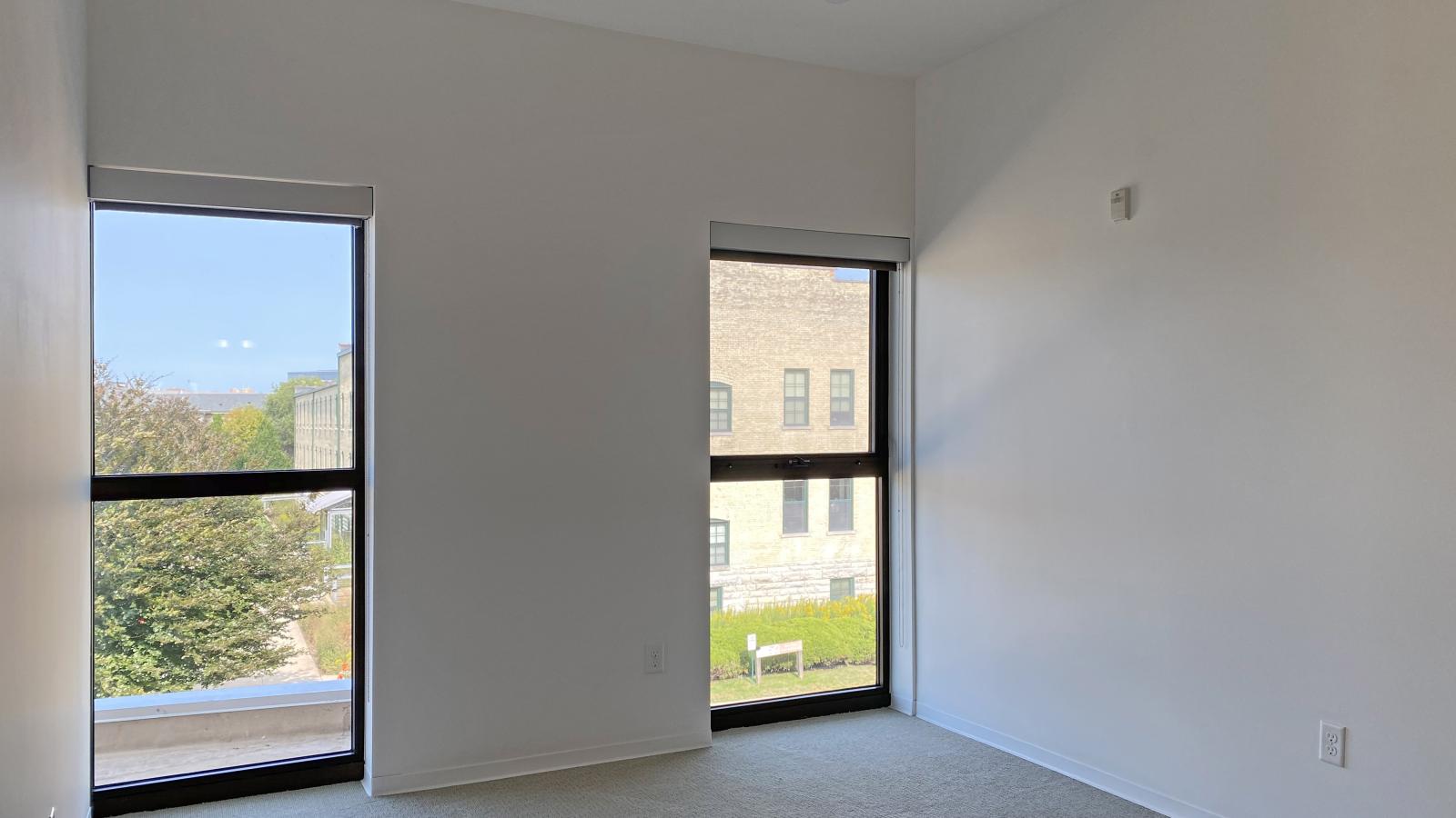 Two bedroom apartment featuring walk in closet and ample storage space at SEVEN27