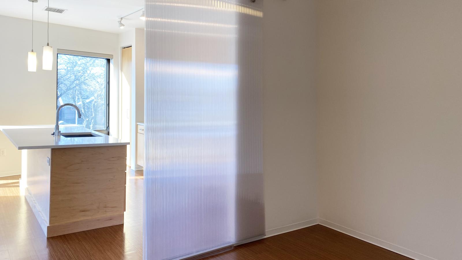 One bedroom apartment with a recessed bedroom set in the interior at SEVEN27