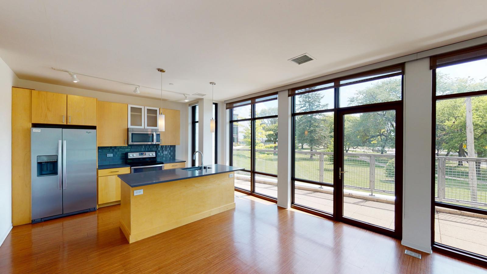 Luxury kitchen with high end finishes and quartz countertops at SEVEN27 in downtown Madison