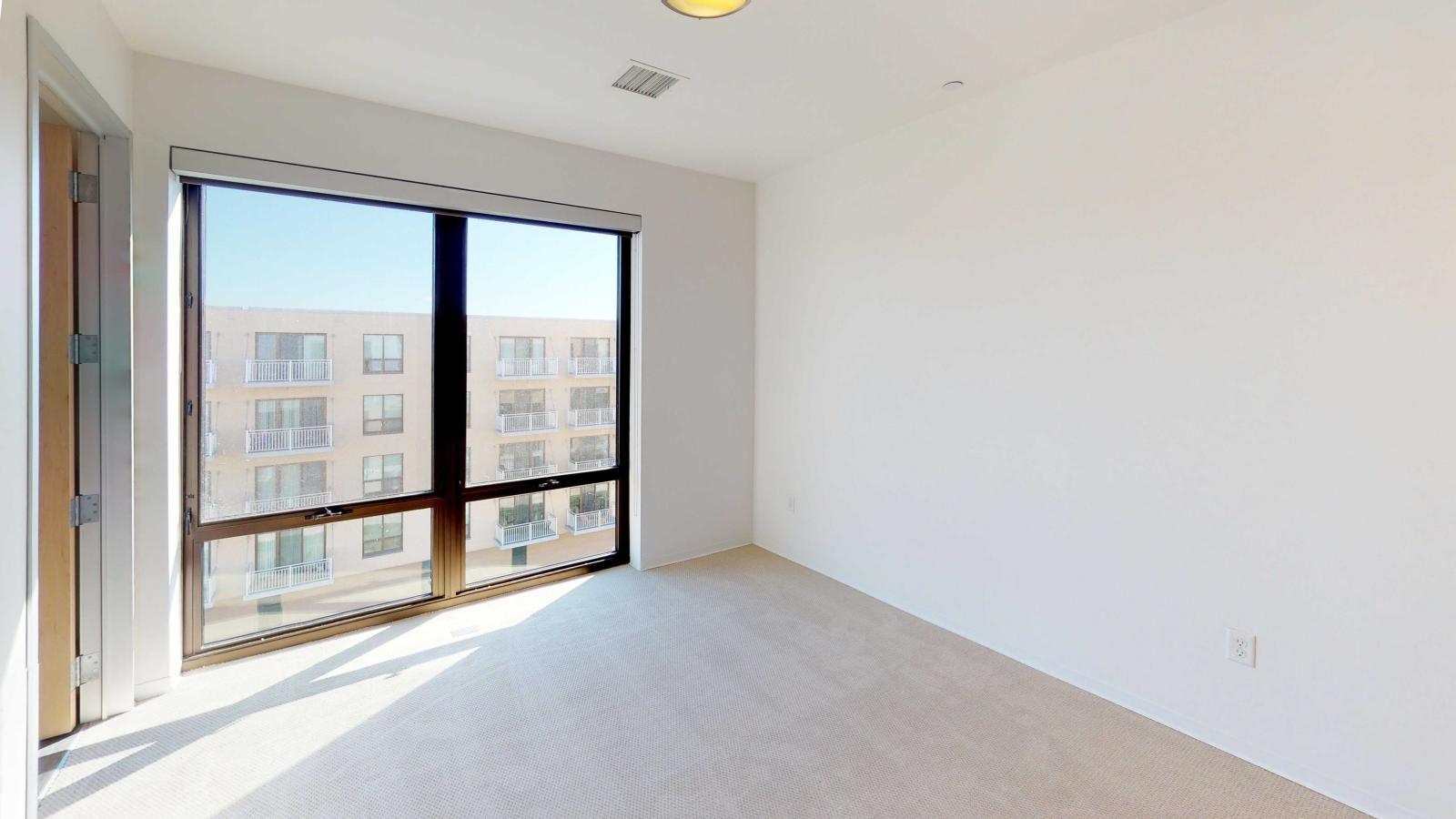Bright and airy two bedroom with spacious closets and modern design at SEVEN27