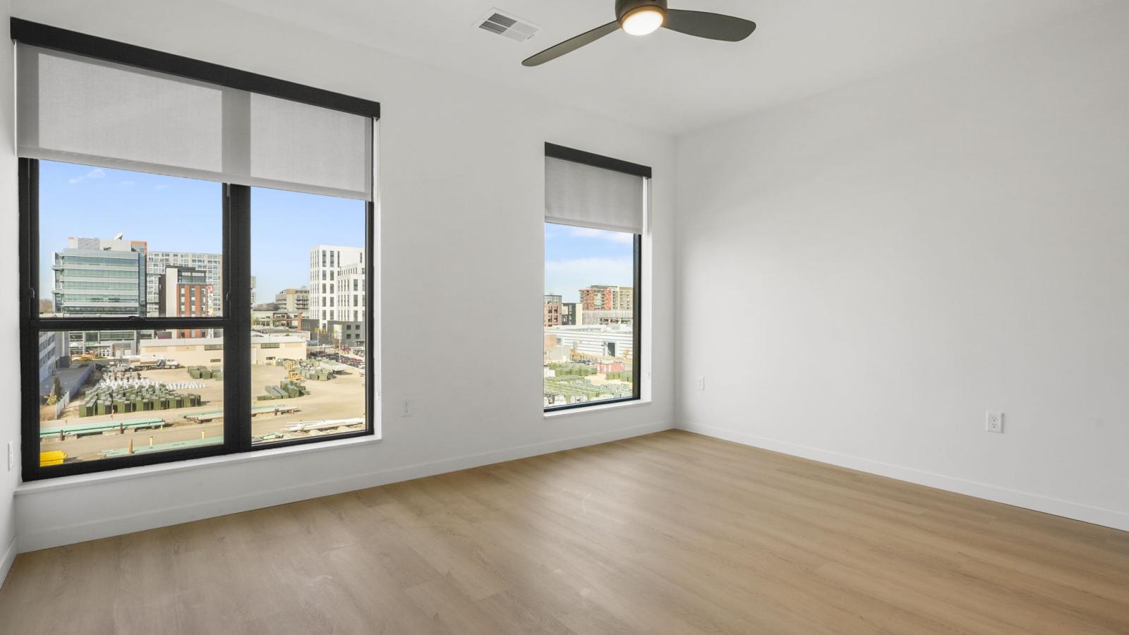 Bedroom interior at The Irwin with soft natural light and functional living space